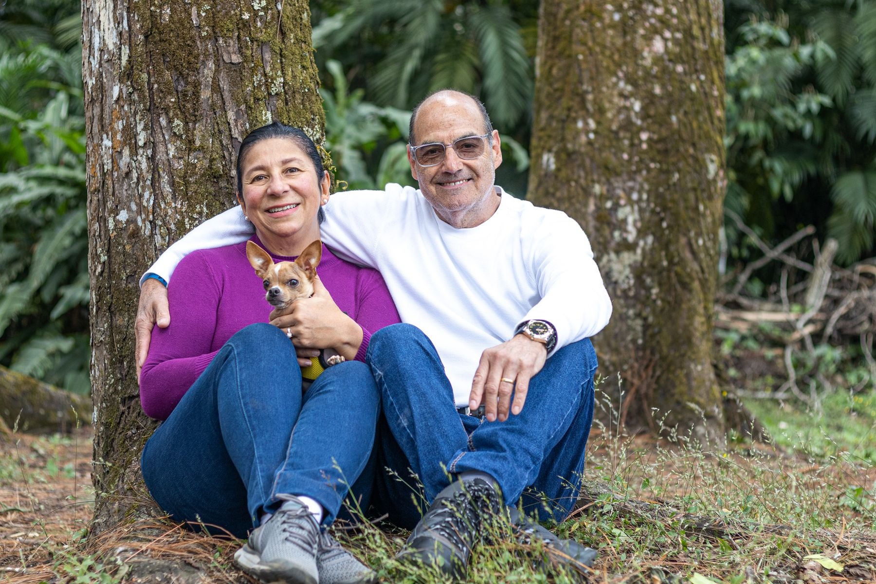A couple sitting together at home.